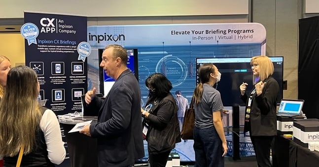 Darby Mason-Werner, Leon Papkoff and Romina Cervantes at the Inpixon CX Briefings booth during the ABPM Supplier Celebration.