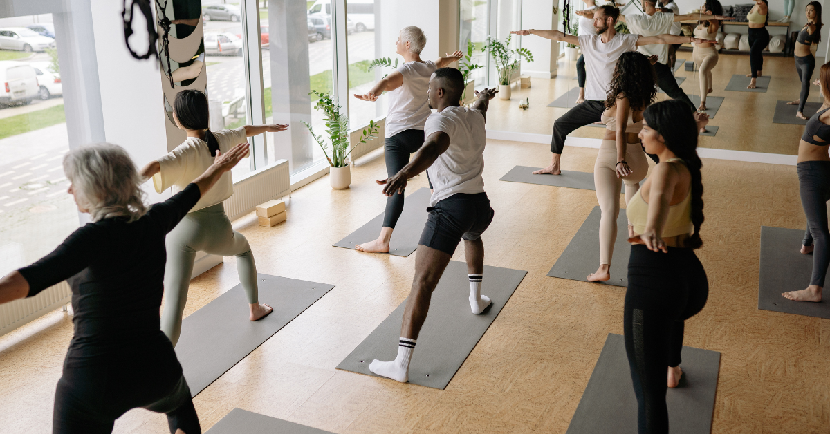 Employees attending a yoga class at the office.